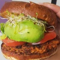 Lentil Burger (V) · Topped with our homemade smoked eggplant sauce, ripe avocado, roma tomatoes & alfalfa sprout...