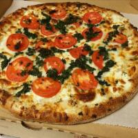 White Pizza (X-Large 16'') · No red sauce. Prepared with sliced tomatoes, garlic, spinach, ricotta cheese, mozzarella che...