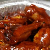 Chicken Wings (8 Pieces) · Baked with your choice of plain, mild, medium, hot, BBQ. Ranch or blue cheese dressing on th...