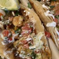 Vegan Tacos · Savory Portbello Mushroooms, Sweet Peppers, Onions, and Kale topped with Vegan Sour Cream an...