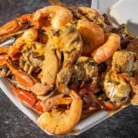 Garlic Crab Combo Tray · Comes with corn egg sausage potatoes and garlic sauce
