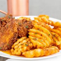 Fried Chicken Wing · Served with nouveau hot sauce and waffle fries.