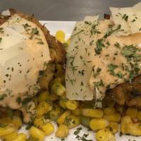 Windy City Crab Cakes · Two hand formed crab cakes served over fried corn.