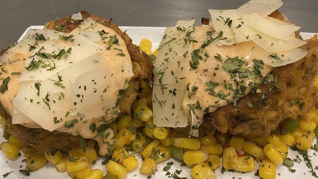 Windy City Crab Cakes · Two hand formed crab cakes served over fried corn.