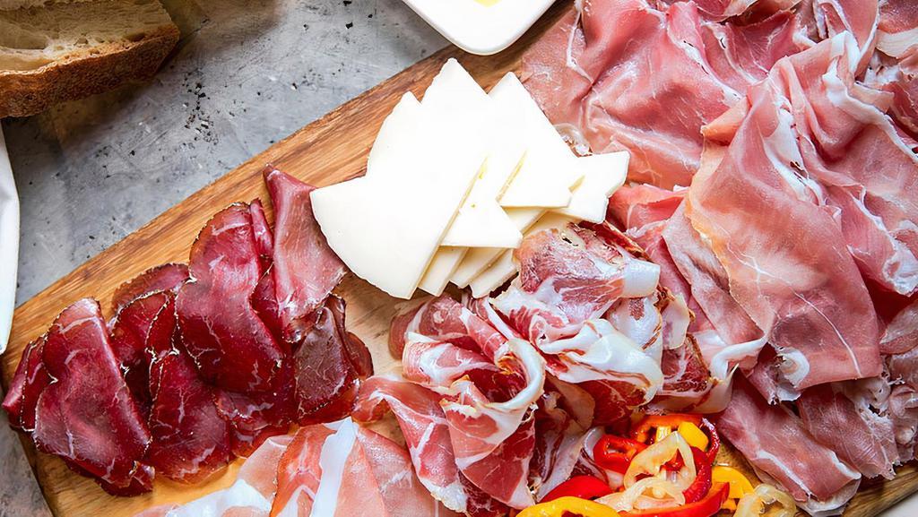 Salumi Board W/Cheese · Imported artisanal meats, pickled vegetables, gluten friendly.