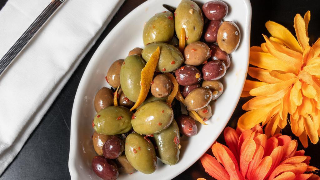Olives · Rosemary, chili, orange zest, gluten friendly.