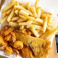 Combo 14: 4 Pieces Shrimp & 1 Piece Fish · Served with French fries  and drink.