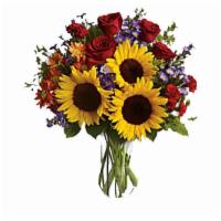 Pure Happiness · A sunny sunflower bouquet gets an autumnal spin with the addition of pretty bronze daisy mum...
