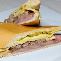Cuban Sandwich · Ham, Swiss cheese, pork, pickles and mustard on pressed Cuban bread.