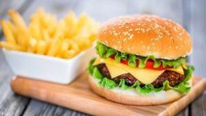 Slider Burger · Single slider burger with American cheese and a choice of a side.