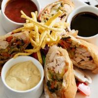 Spring Rolls · handmade, grilled chicken, Napa cabbage, garlic, soy, ginger, three sauces for dipping.