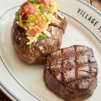 Filet Mignon · served with choice of two sides.

Consuming raw or undercooked meats, poultry, seafood, shel...