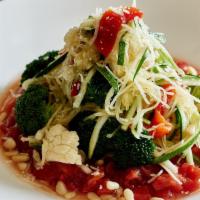 Spaghetti Squash And Zucchini · cauliflower, broccoli, roasted red peppers, pine nuts, Parmesan, plum tomato sauce