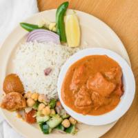 Butter Chicken · Boneless chicken cooked tandoori style cooked with fresh tomato sauce.