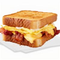 Big Breakfast Sandwich · Your choice  of bacon or sausage with eggs, cheese and mayo between two pieces of Texas toast.