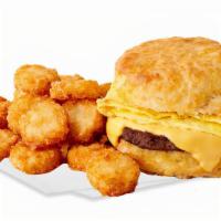 Sausage, Egg & Cheese Biscuit Combo · Sausage patty, egg, and cheese  on a Jack's made-from-scratch buttermilk biscuit with hash b...