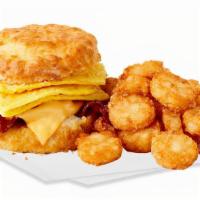 Bacon, Egg & Cheese Biscuit Combo · Bacon, egg, and cheese on a Jack's made-from-scratch buttermilk biscuit with hash browns and...