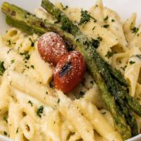 Alfredo Penne Pasta · Seasoned asparagus and cherry tomatoes