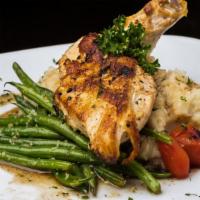 Airline Chicken Breast · Garlic mashed potatoes, sauteed green beans w/au sus sauce.