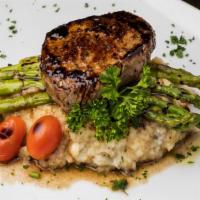 Filet Mignon · Grill seasoned asparagus, garlic mashed potatoes, w/red wine reduction.