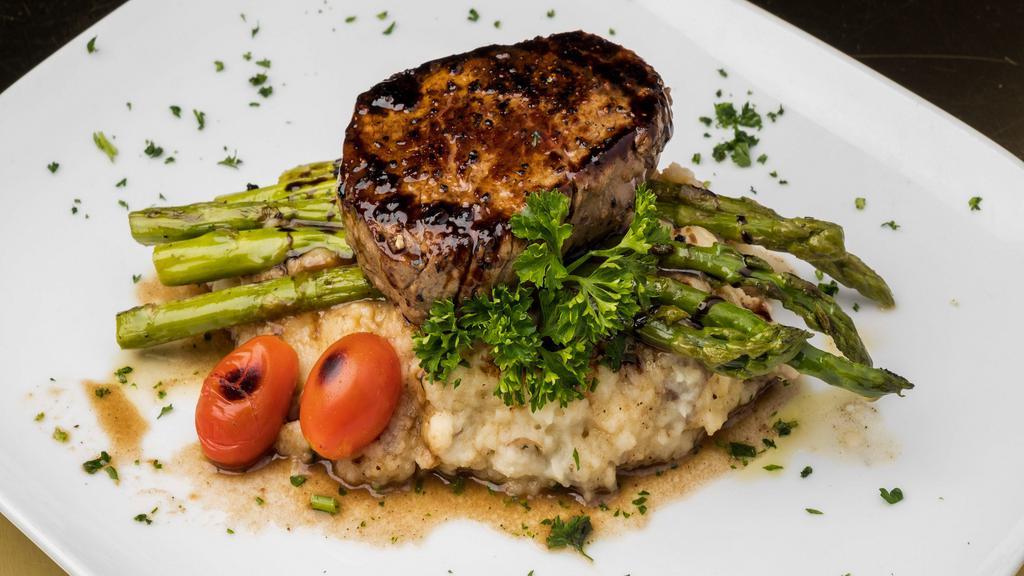 Filet Mignon · Grill seasoned asparagus, garlic mashed potatoes, w/red wine reduction.