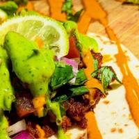 Street Tacos · Three flour or corn tortillas filled with your choice of beyond 