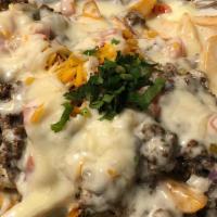 Skyy Fries · Fried served with shredded cheddar, mozzarella, beef and jalapeño