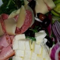 Antipasto Salad · Bed Mixed greens, grape tomatoes , olives, onions, pepperoncini, Genoa  salami, ham, fresh m...