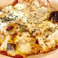 Baked Ziti · Served with a side salad and fresh garlic rolls.