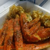 Garlic Snow Crab Tray · Three Snow crab clusters with our delicious garlic butter and garlic seasoning.