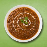 Creamy Lentil Love · Prepared with the combination of black gram and lentil, slow cooked with Indian spices and c...