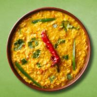 Lentil Fry League · Loosened yellow lentils cooked with spices, tomato /spinach, green chili, cumin and onions.