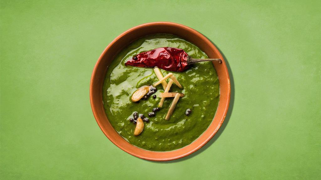 Spinach Curry  · Fresh spinach cooked with Indian herbs and spices.