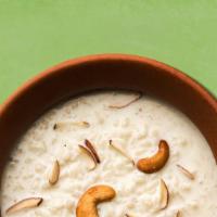 Rice Pudding · Simple rice cooked in sweetened milk with add-ins like ground cinnamon or raisins.