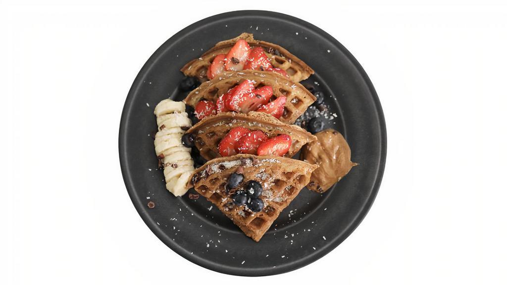 Greeng Waffle · Gluten Free Waffle. Tapioca Flour, Coconut Flour, Maca, Organic Eggs, Vanilla Extract, Cinnamon.  . Topped with: Berries, Banana, Maple Syrup, Cacao Nibs, Coconut Flakes and Almond Butter