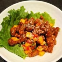 (Ps) Mango Chicken · Chicken nugget sauteed with cube mango in spicy sweet and sour mango sauce, sprinkle with wh...
