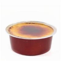 Creme Brulee · A rich custard based finished with a torched caramelized sugar top.