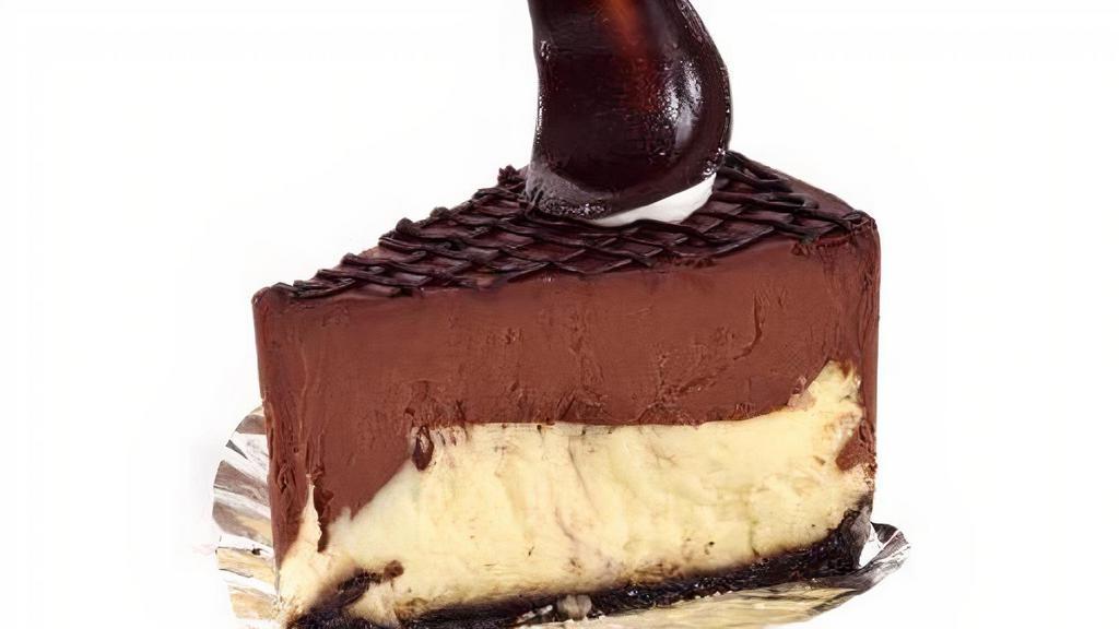 Chocolate Ganache Cheesecake · A rich chocolate ganache layered above a classic cheesecake, with a crushed Oreo cookie crust.