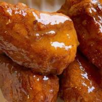 Chickun Wingz · 5 wingz packed w/ 27.5g soy protein with sugar cane brown tossed in our Buffalo, BBQ Sauce, ...