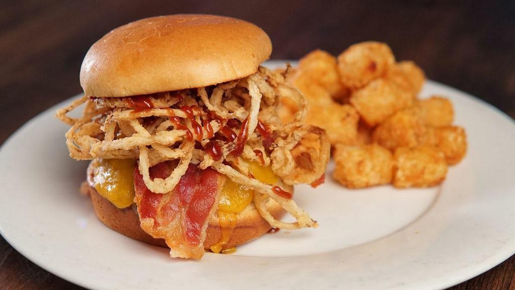 *Smokehouse Burger · Fresh Ground Beef, Two Slices of Thick Cut Applewood Smoked Bacon, Sweet Baby Ray’s BBQ Sauce, Shredded Jack & Cheddar Cheese, Crispy Onion Straws