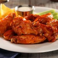 Wing Entree · 8 Jumbo Wings, Tossed in your Choice of Sauce, served with Celery and Your Choice of Dipping...