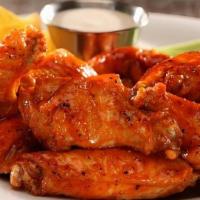 Large Wings · 12 Jumbo Wings, Tossed in your Choice of Sauce, served with Celery and Your Choice of Dippin...