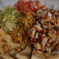 Food Truck Chicken & Rice · straight from the streets of NYC, marinated chopped chicken, yellow rice, white sauce, samba...