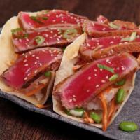 *Ahi Tuna Tacos  · Cajun seared ahi tuna, spring mix, fresh carrot,. edamame, spicy sriracha aioli. & Asian dre...