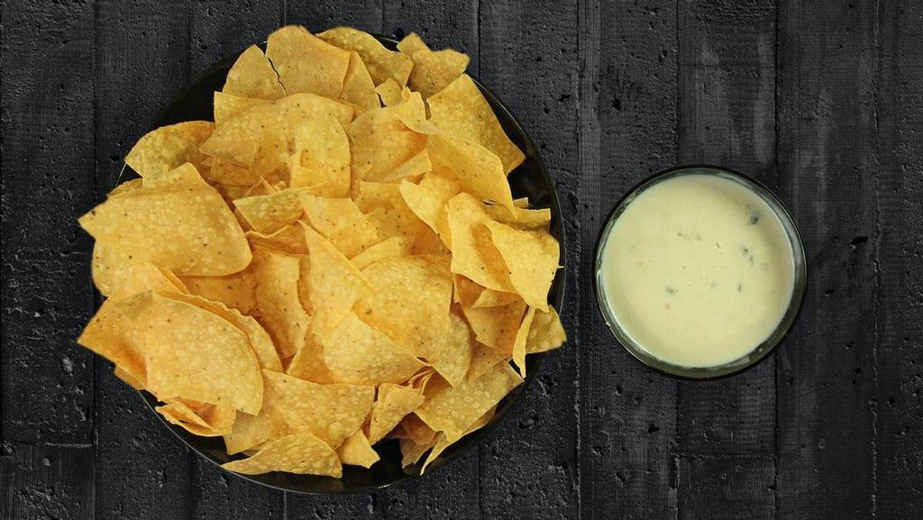 Chips & Queso Tailgate Package · 1 Gallon of Tortilla Chips and a Large Bowl of our Signature Queso Dip