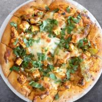 Popular Paneer Pizza · Cubes of fresh cottage cheese cooked in a spinach gravy infused with garlic, ginger, and spi...