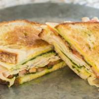 Turkey Pesto · oven roasted turkey breast, dijon mustard, sliced tomato, provolone cheese & our house made ...