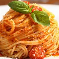 Vegan Tomato Sauce Spaghetti · Spaghetti pasta with tomato sauce and basil.