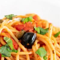 Vegan Puttanesca Spaghetti · Spaghetti pasta with tomato sauce, olive oil, black olives, capers, and garlic.