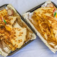 Quesadilla Al Pastor(Extra Grande ) · queso mexicano , pork maserado con sumo de pina )